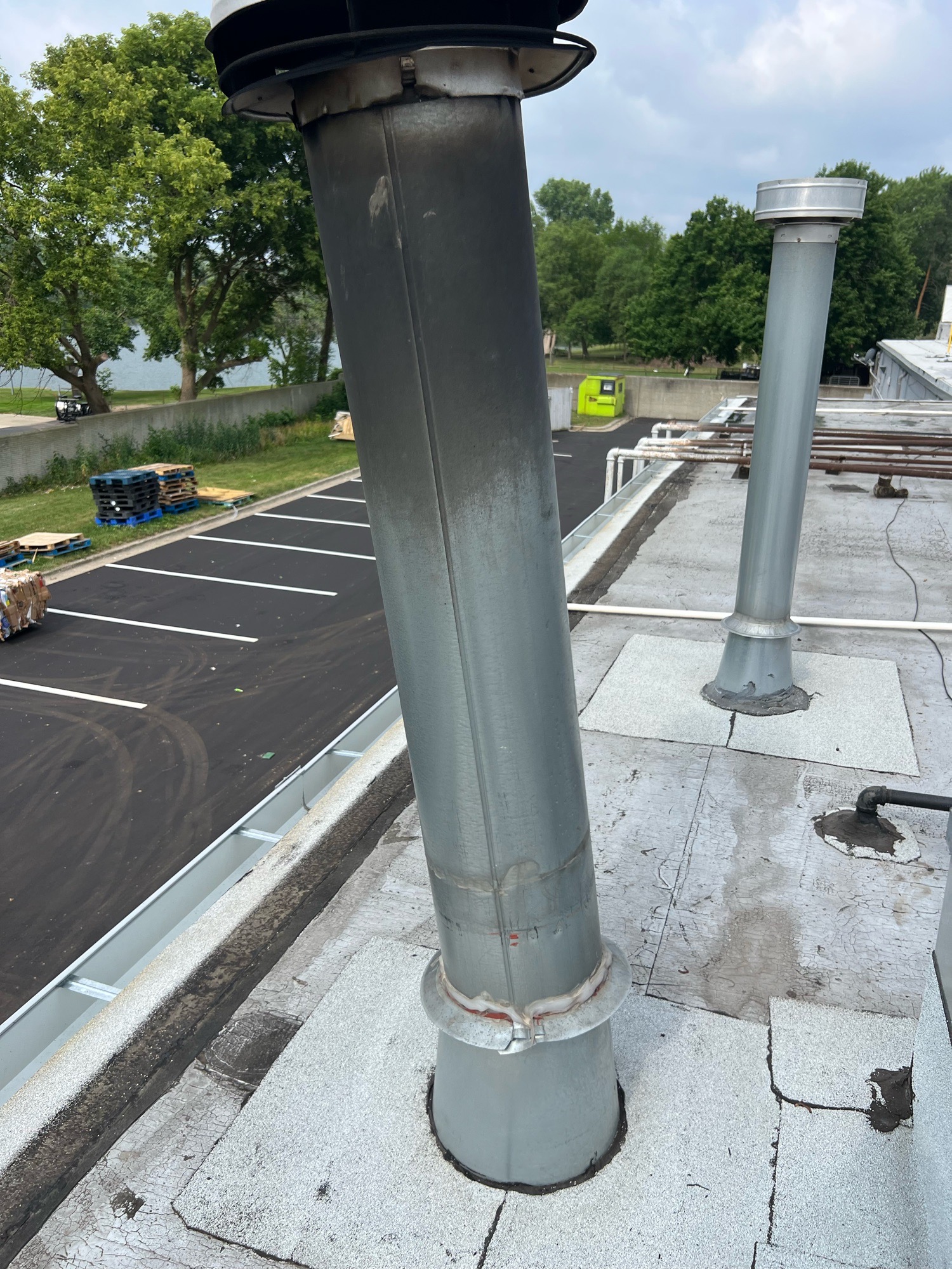 Commercial rooftop plumbing vents and mechanical penetrations
